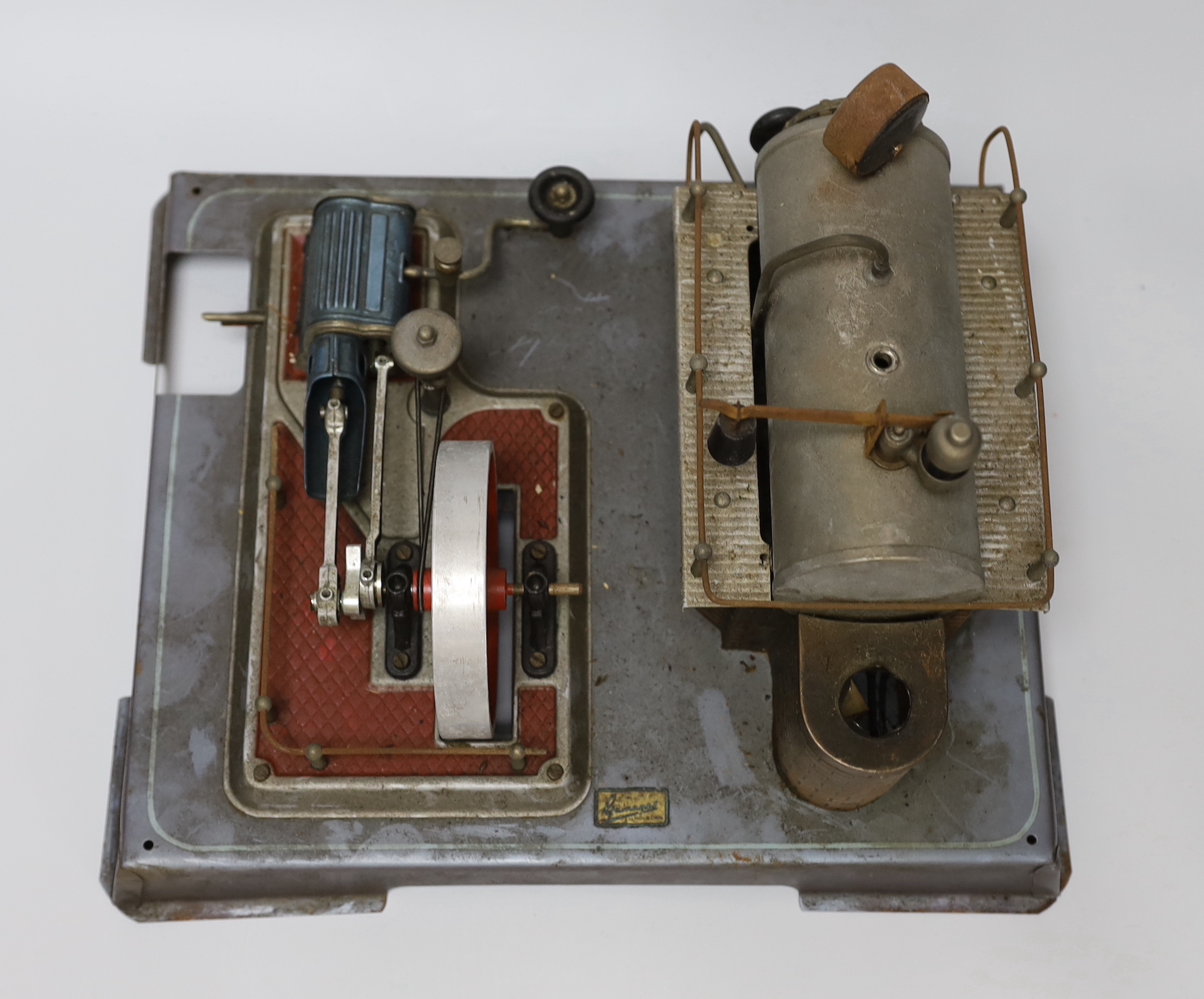 A Gamages single-cylinder steam engine, flywheel diameter 10cm